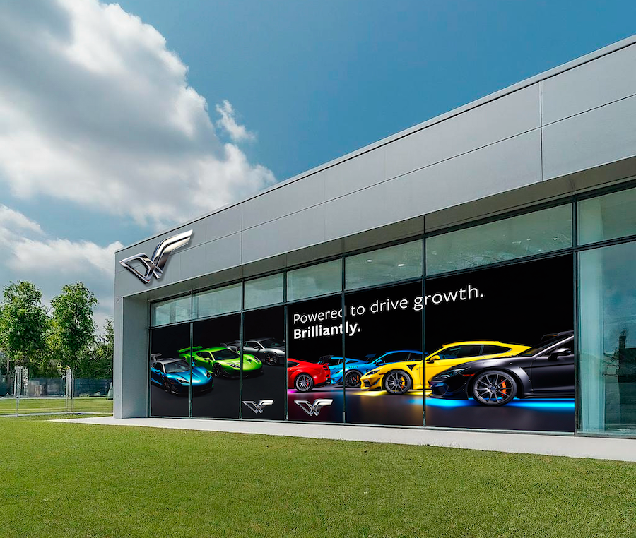 Car dealership promotional window graphics.