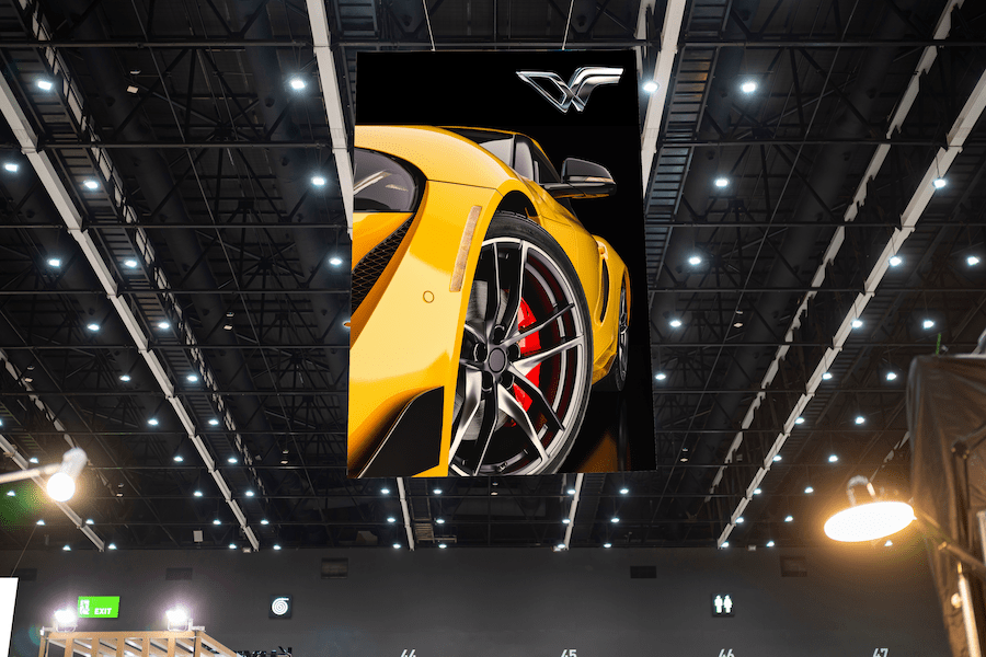 Yellow car printed on a huge indoor hanging banner.